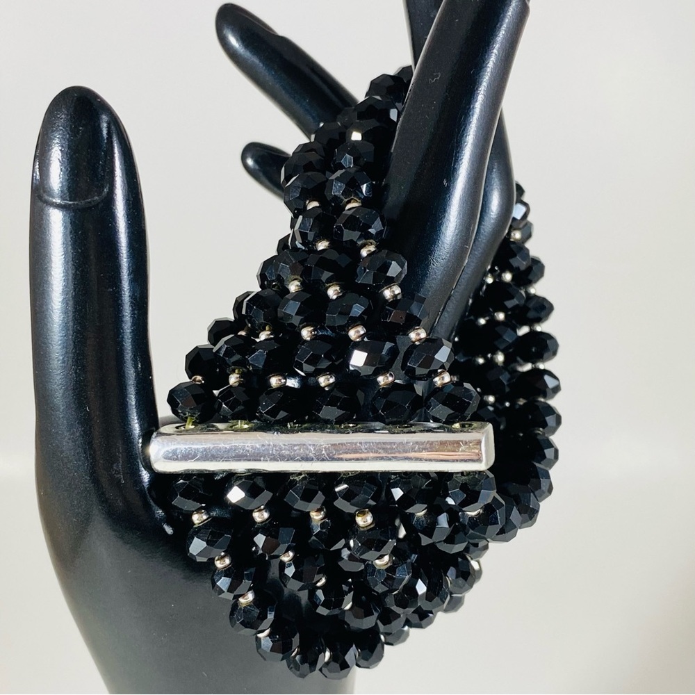 Stunning jet black 6 row crystal stretch bracelet with silver bar embellishment